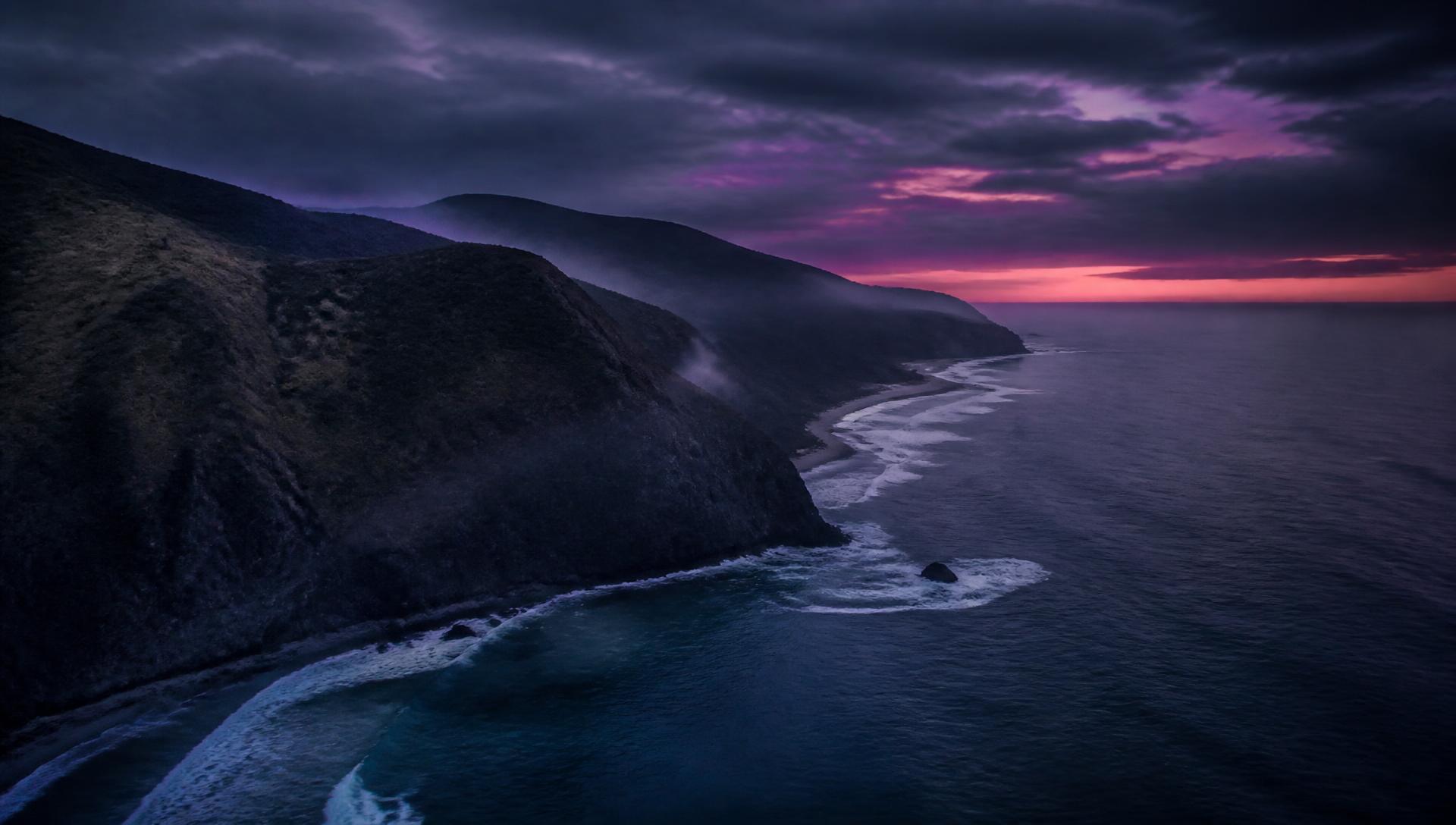Rugged New Zealand coastline at dusk